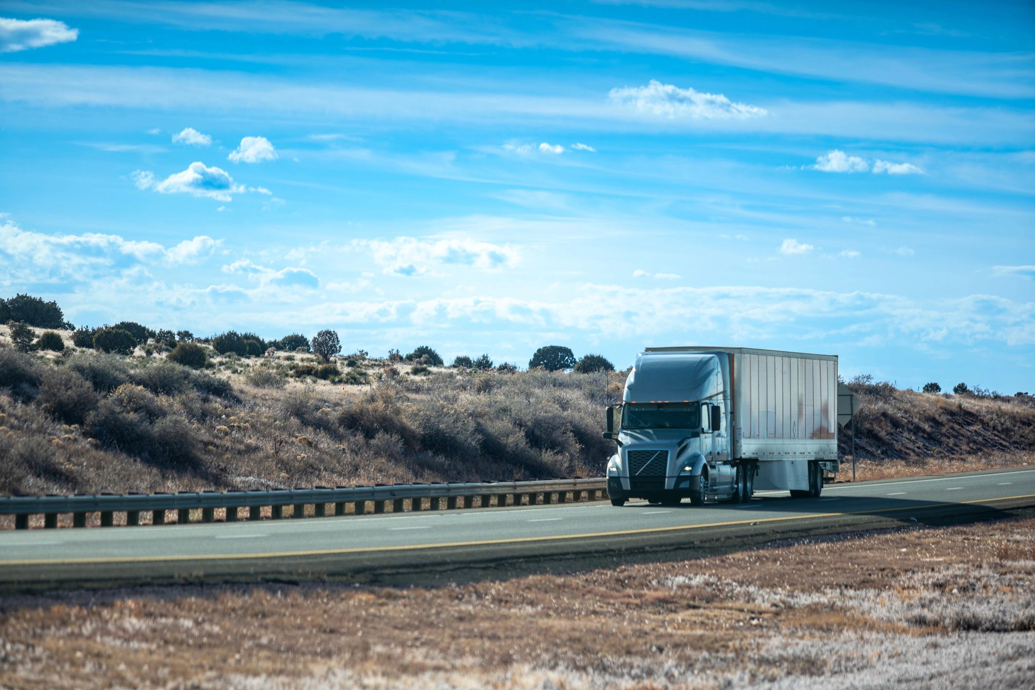Semi-truck transporting freight on a highway